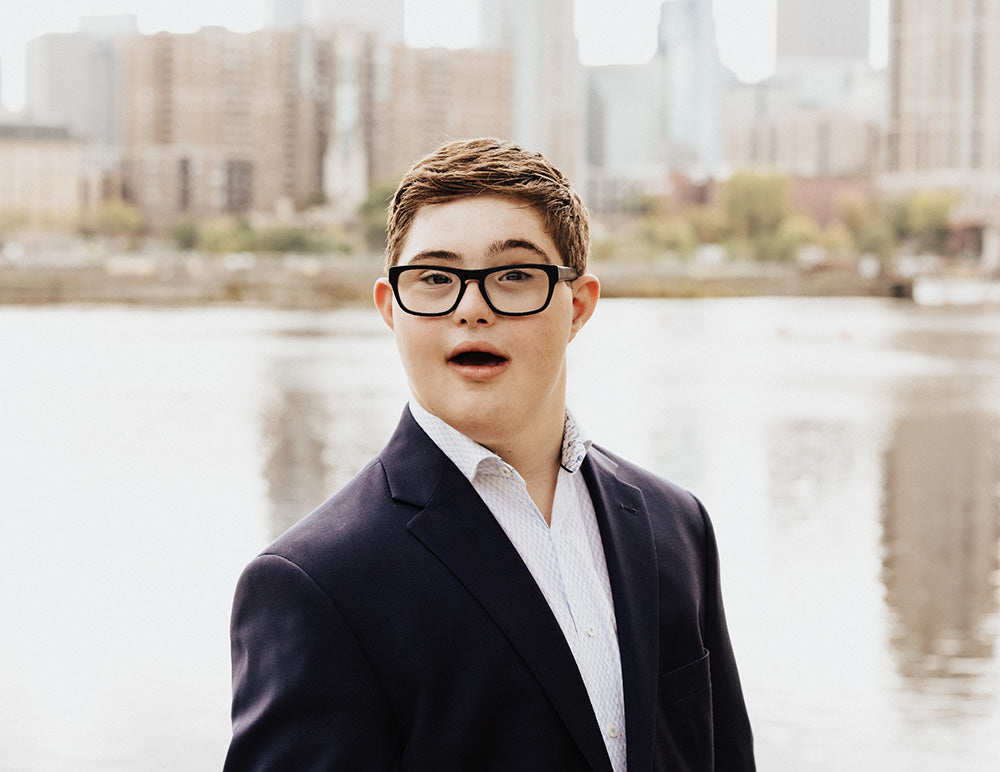 A picture of Max Mix founder Max, against a skyline background, raising an eyebrow at the camera.