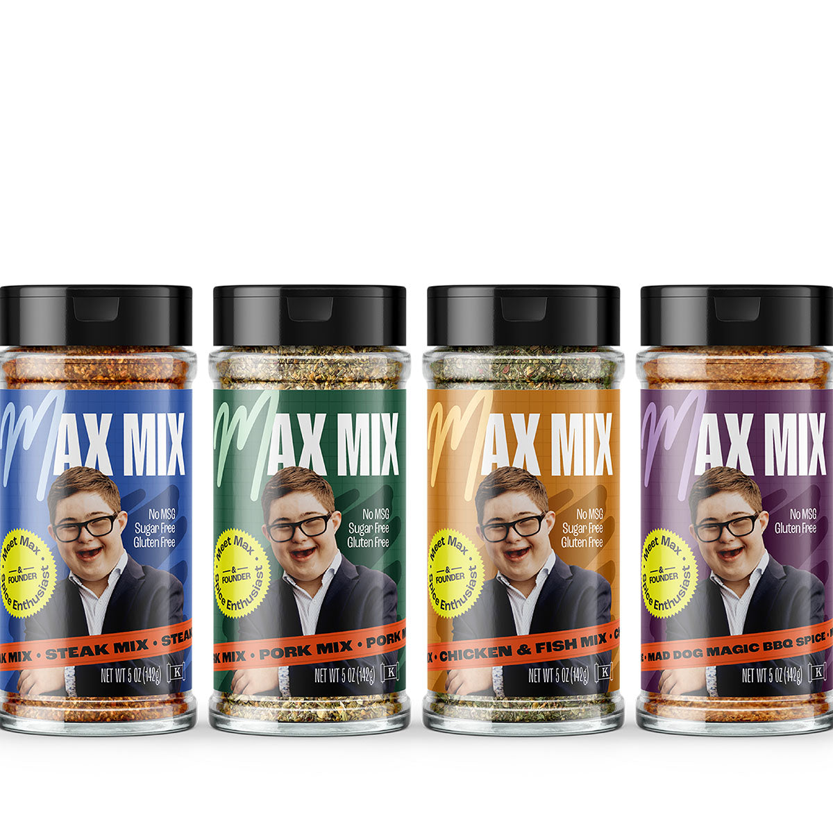 Four bottles of Max Mix product against a white background.
Left to right: Steak Mix (blue), Pork Mix (green), Chicken & Fish Mix (orange), and Mad Dog BBQ (purple)