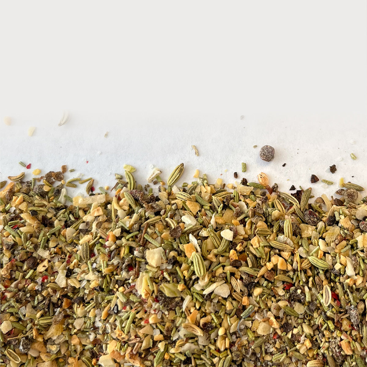 Close-up picture of Pork Mix, scattered over a white background.