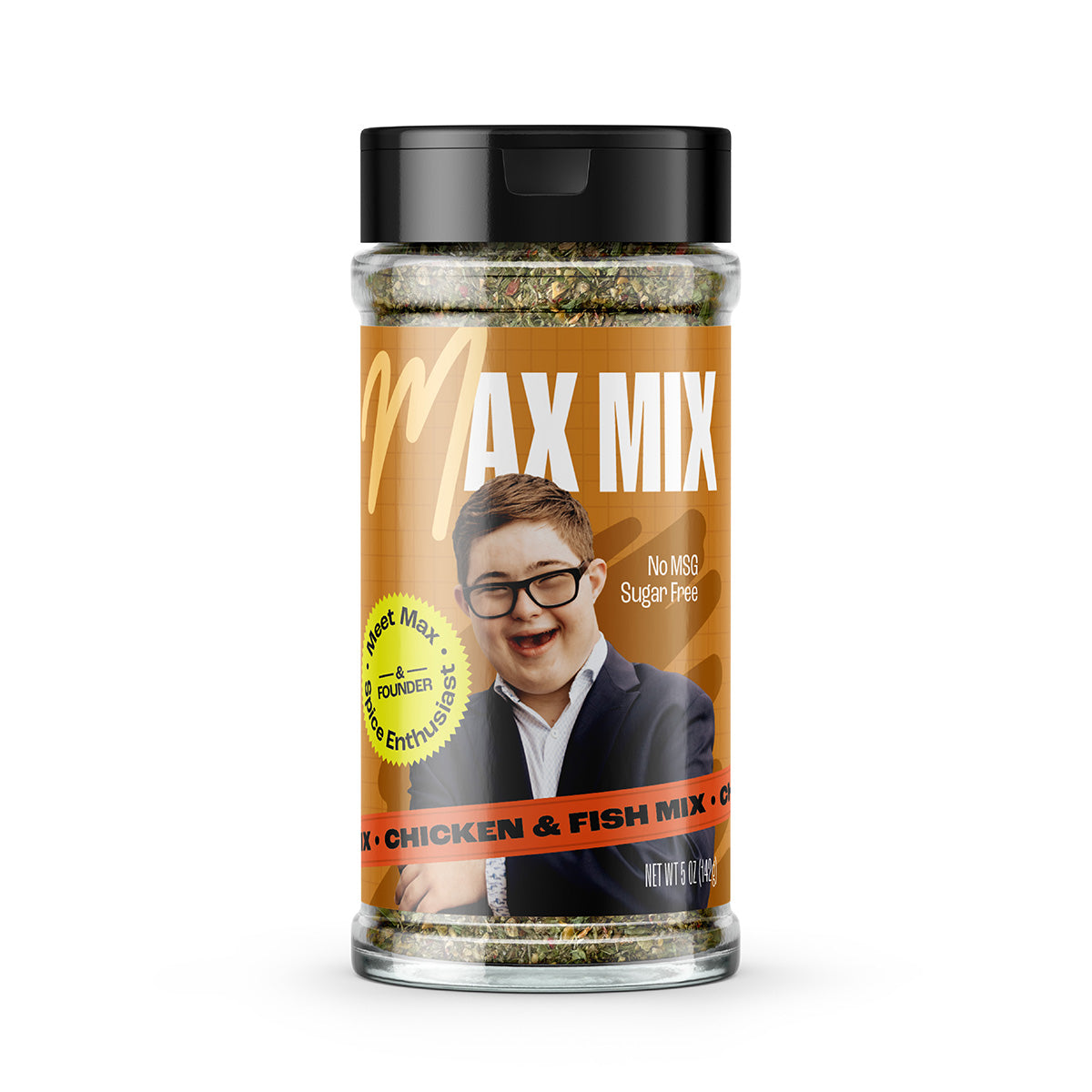 Shaker of Max Mix Chicken & Fish Mix. The label shows a picture of founder Max on an orange-brown textured background, with a yellow medal that reads "Meet Max: Spice Enthusiast"